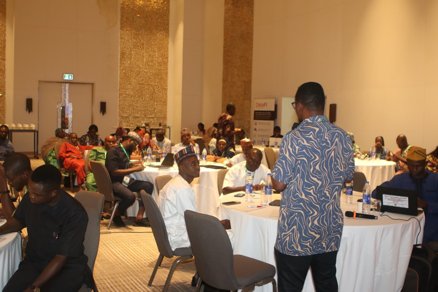 Seyi facilitating a data quality training session